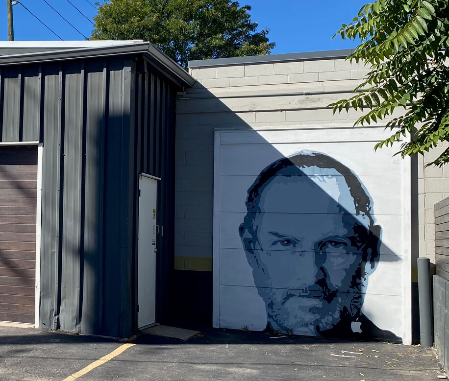 Mural of Steve Jobs on garage door