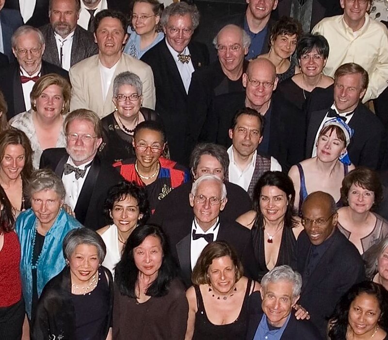 Overhead photo of Loeb gathering of 2006, with participants in cocktail dress