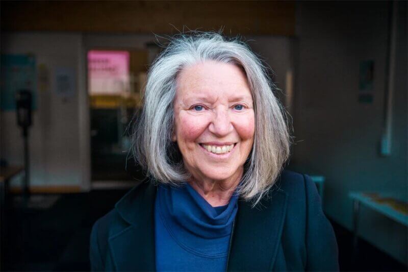 Headshot of smiling Nancy Fraser