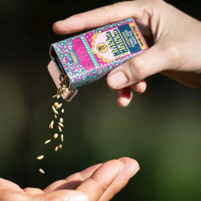 Photo showing one hand pouring Chikka Chikka into another hand