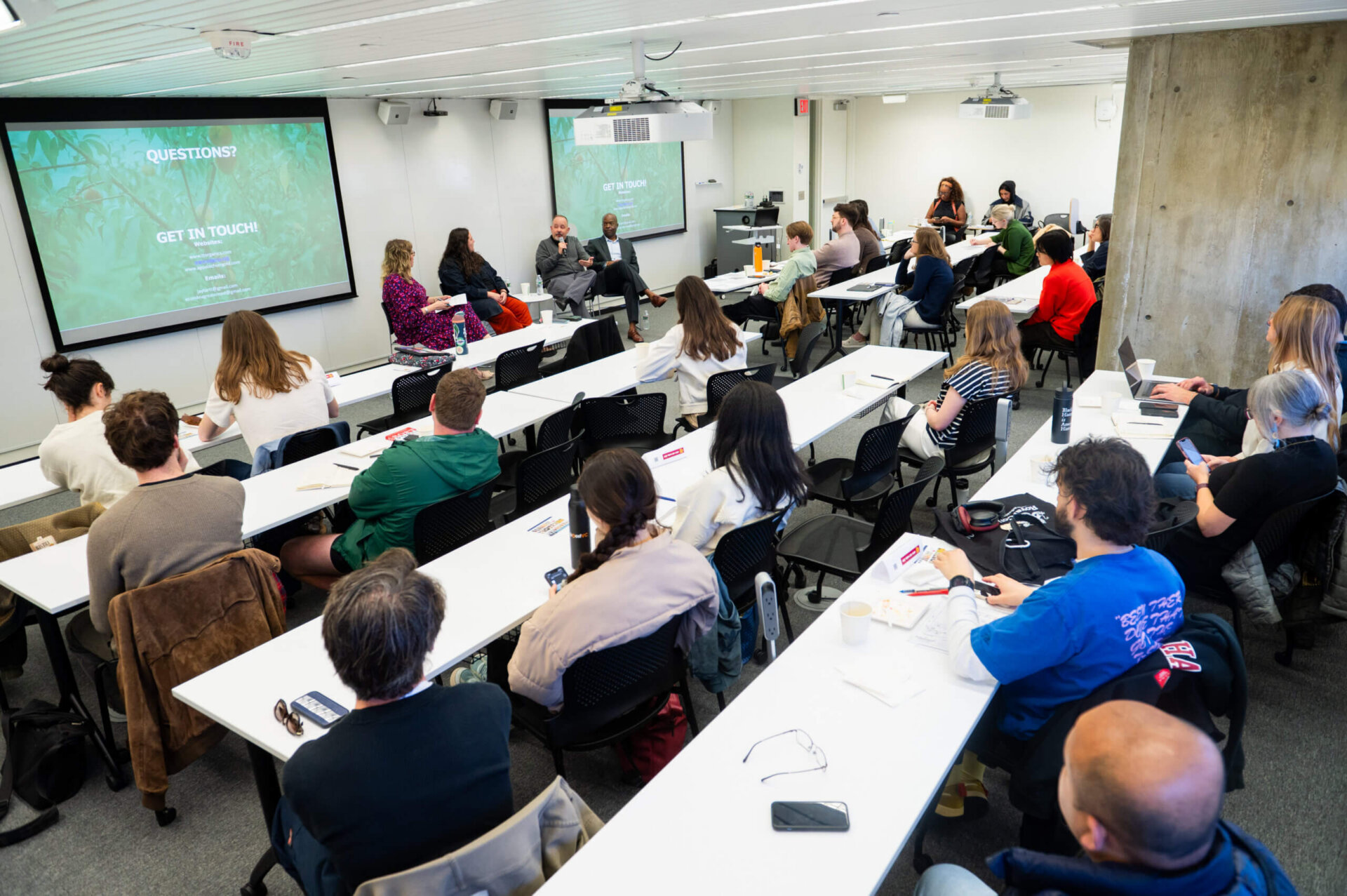Panel 2 showing speakers and classroom